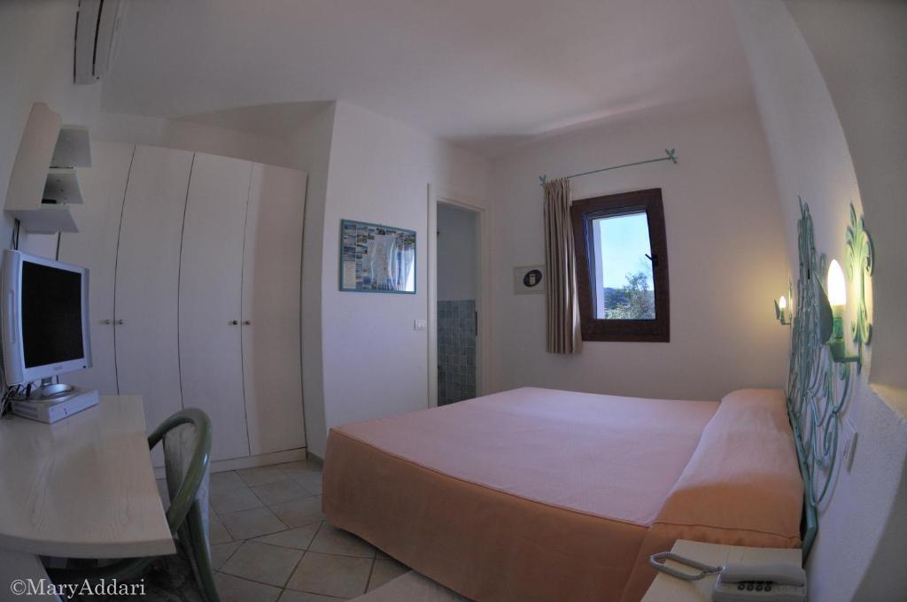 Hotel Villa Gemella Байя-Сардинія Номер фото