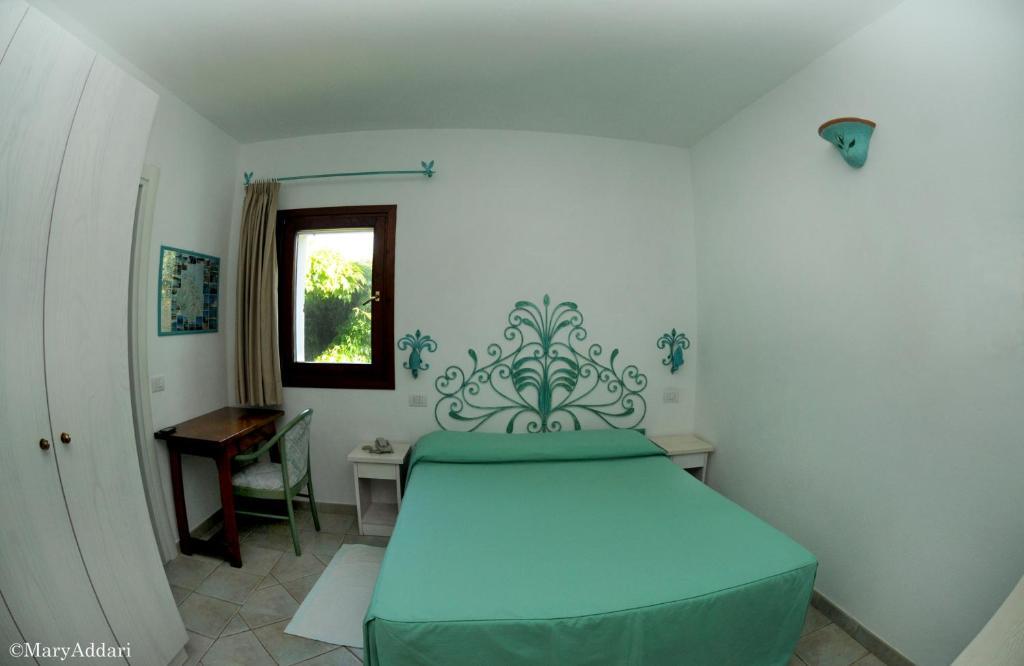 Hotel Villa Gemella Байя-Сардинія Номер фото